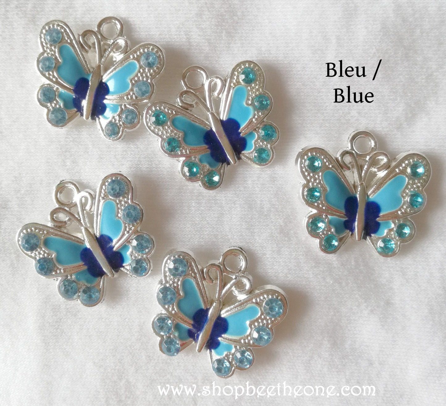 Breloque en émail Papillon argenté et strass assortis - 21 mm - trou 2 mm - 3 coloris disponibles
