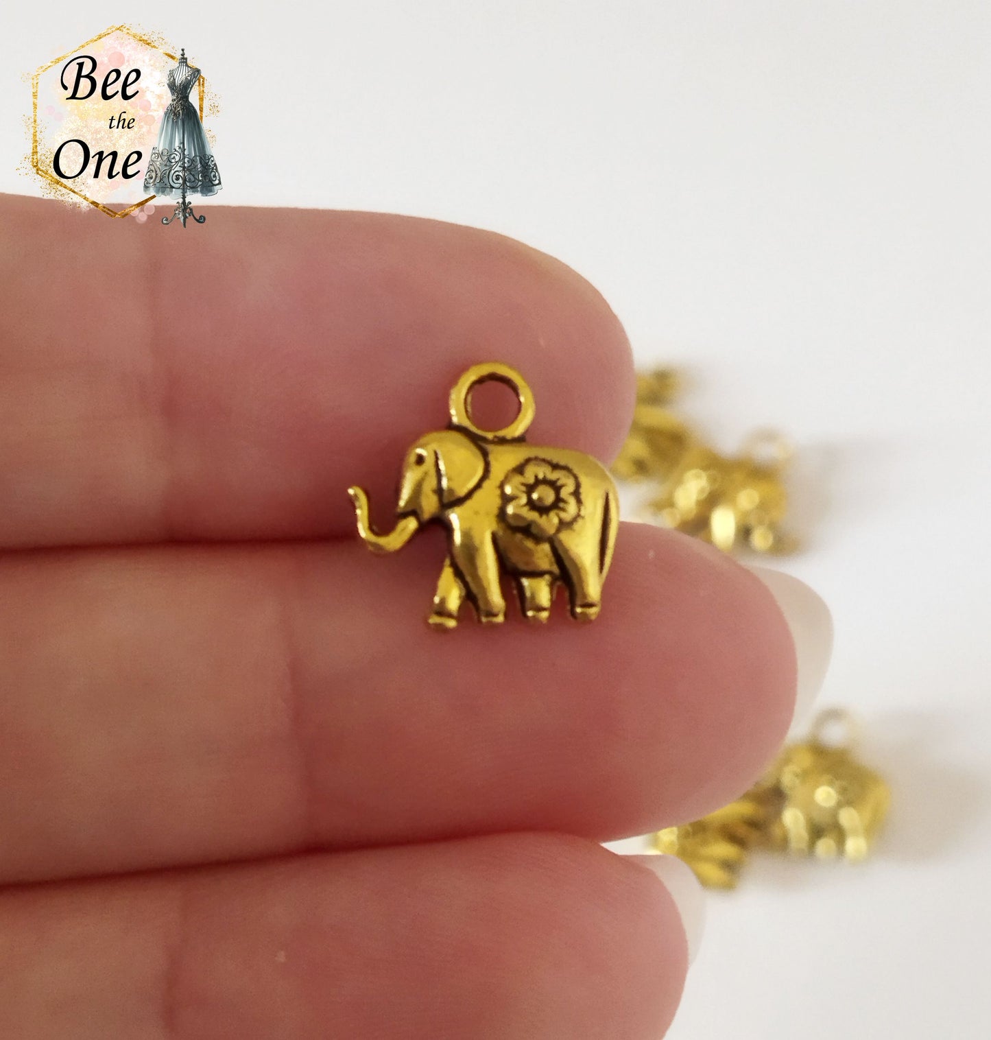 Mini Breloque Eléphant fleuri - 11 mm - doré