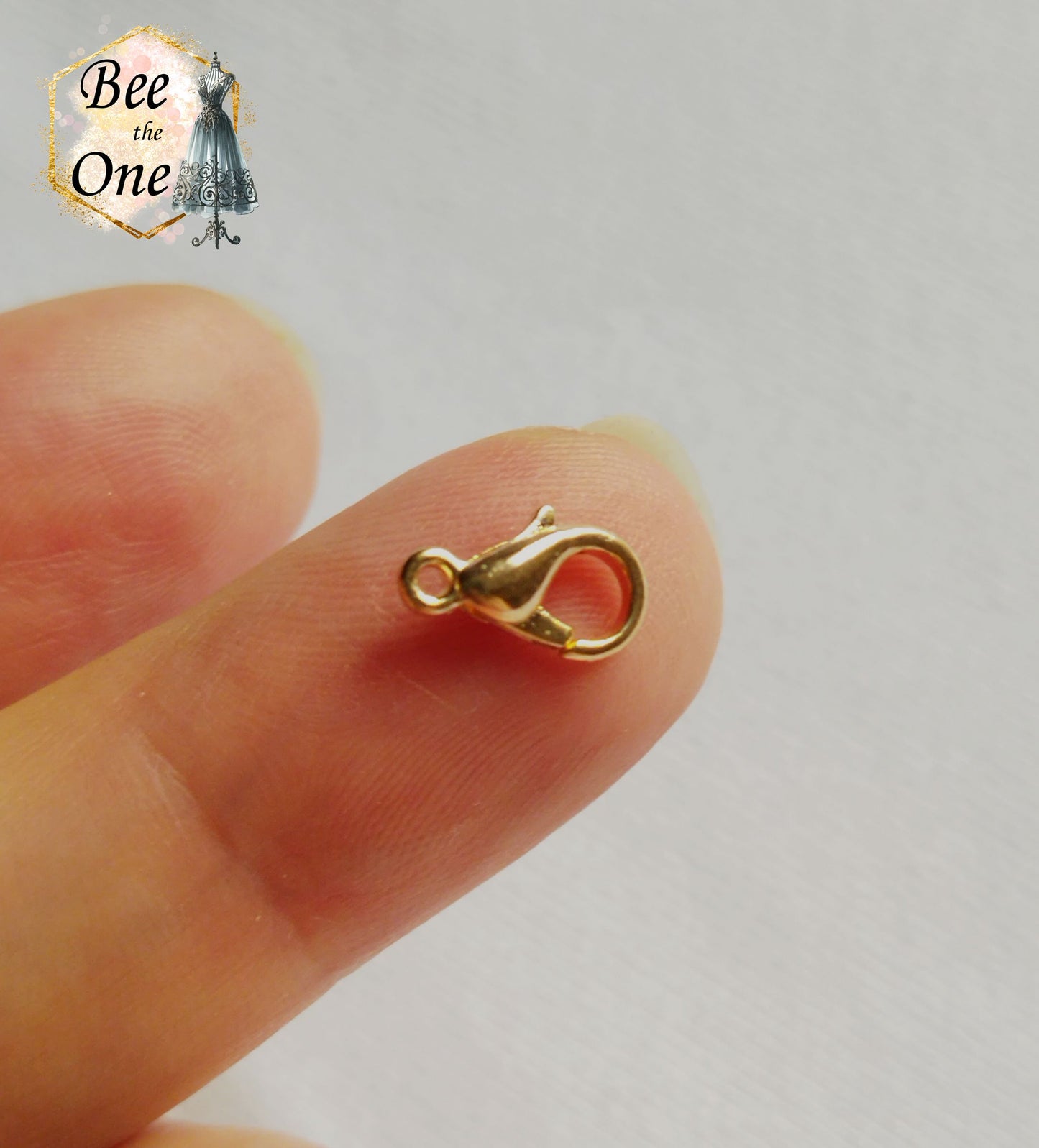 Fermoir mousqueton pince "homard" - 10 x 5 mm - Doré ou doré clair