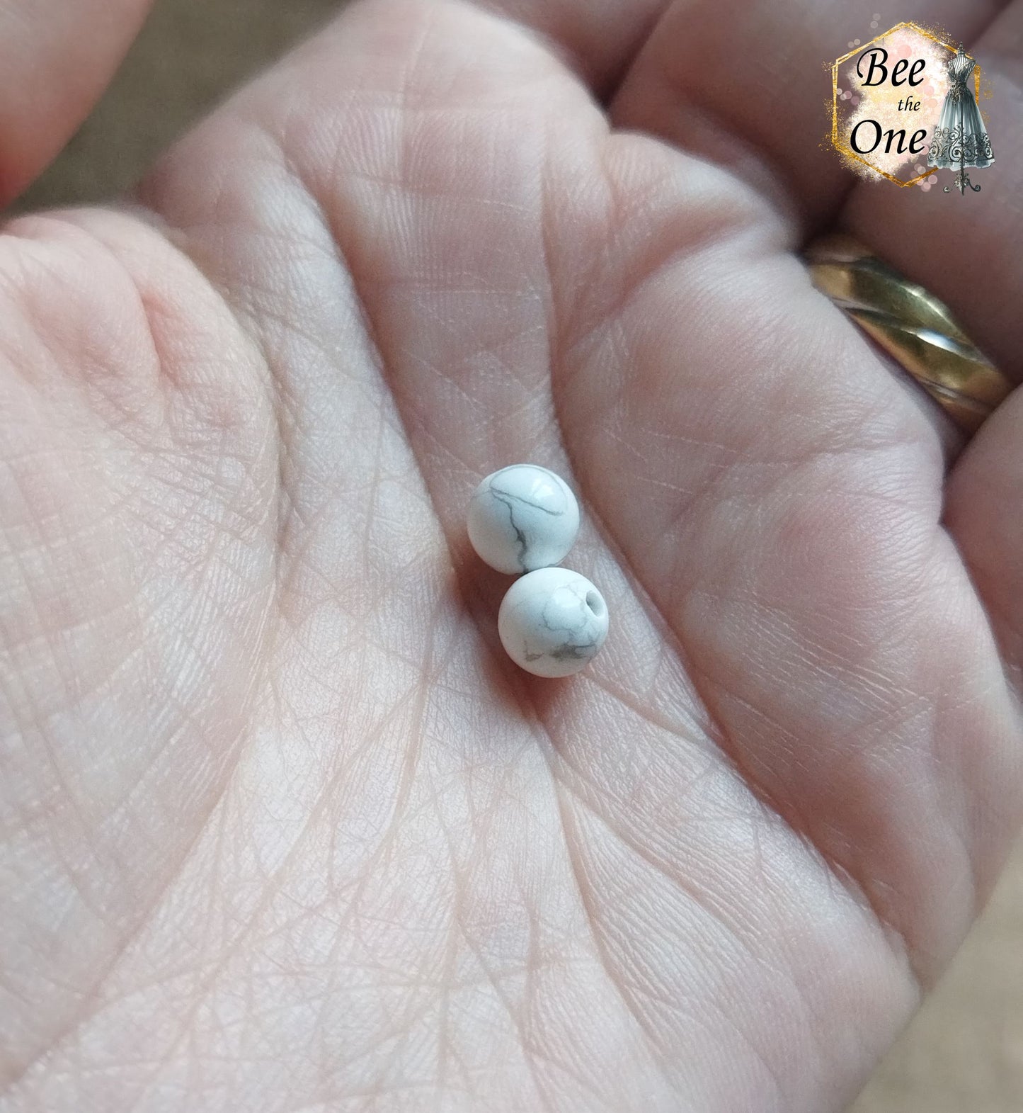Perle ronde en howlite blanche naturelle - grade A - 6 mm