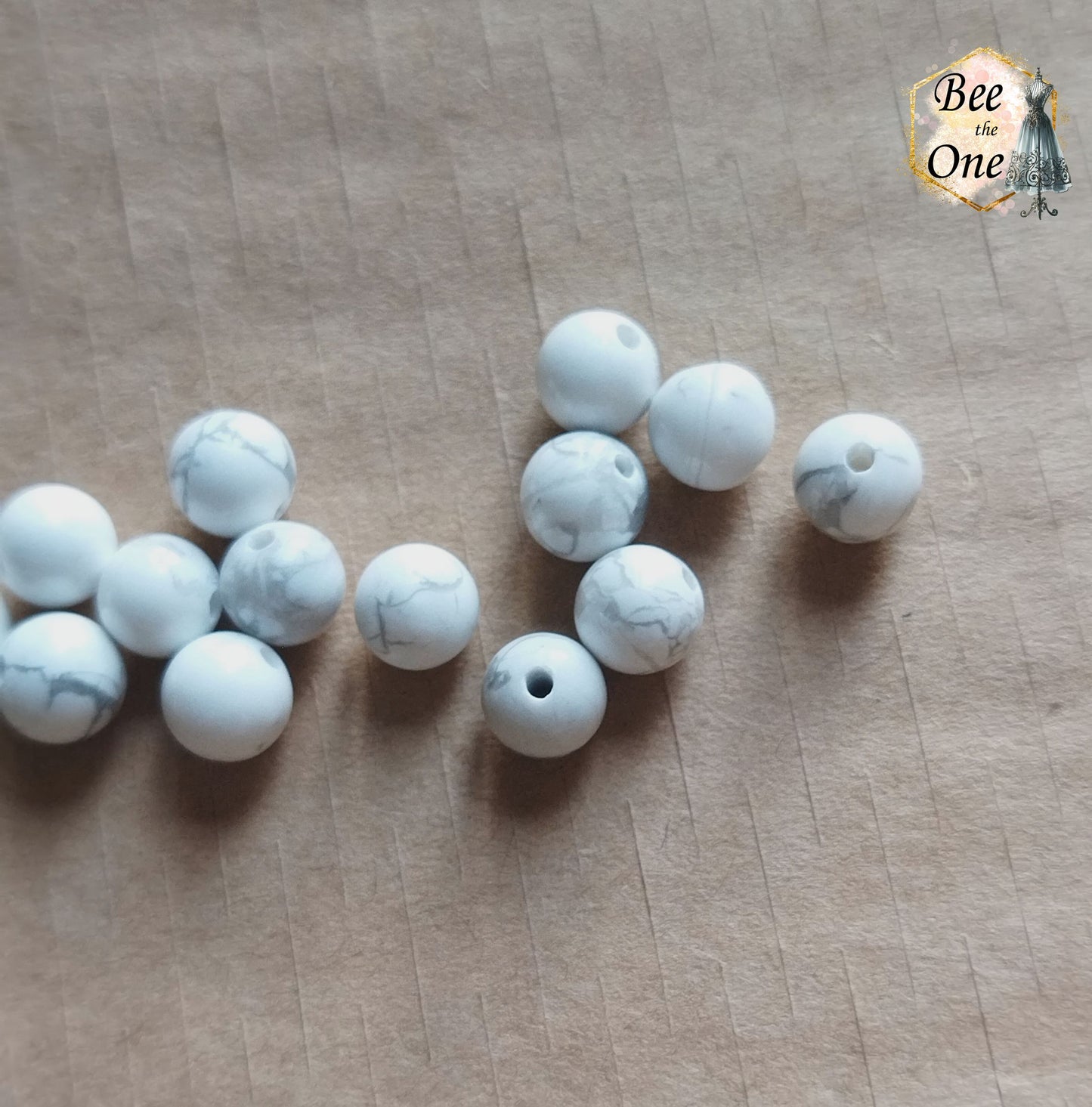 Perle ronde en howlite blanche naturelle - grade A - 6 mm