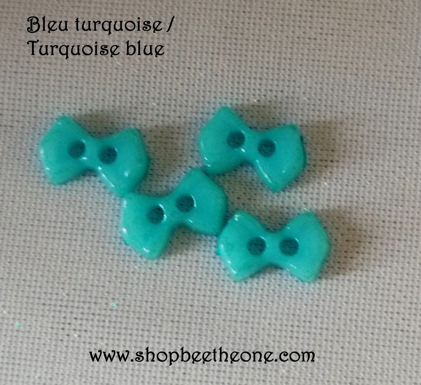 Mini Bouton Noeud en plastique - 9 mm - 12 coloris disponibles