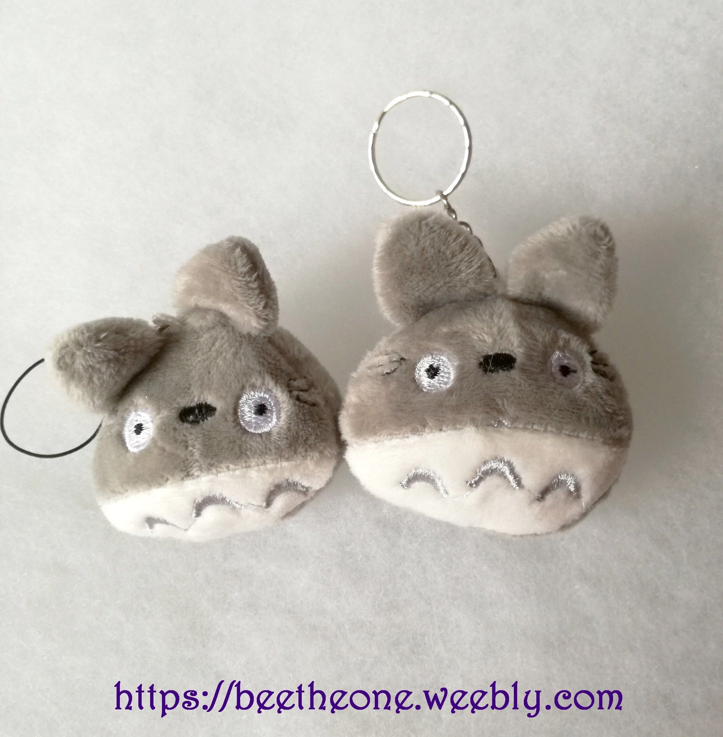 Porte-clé ou Bijou de portable peluche Monstre gris