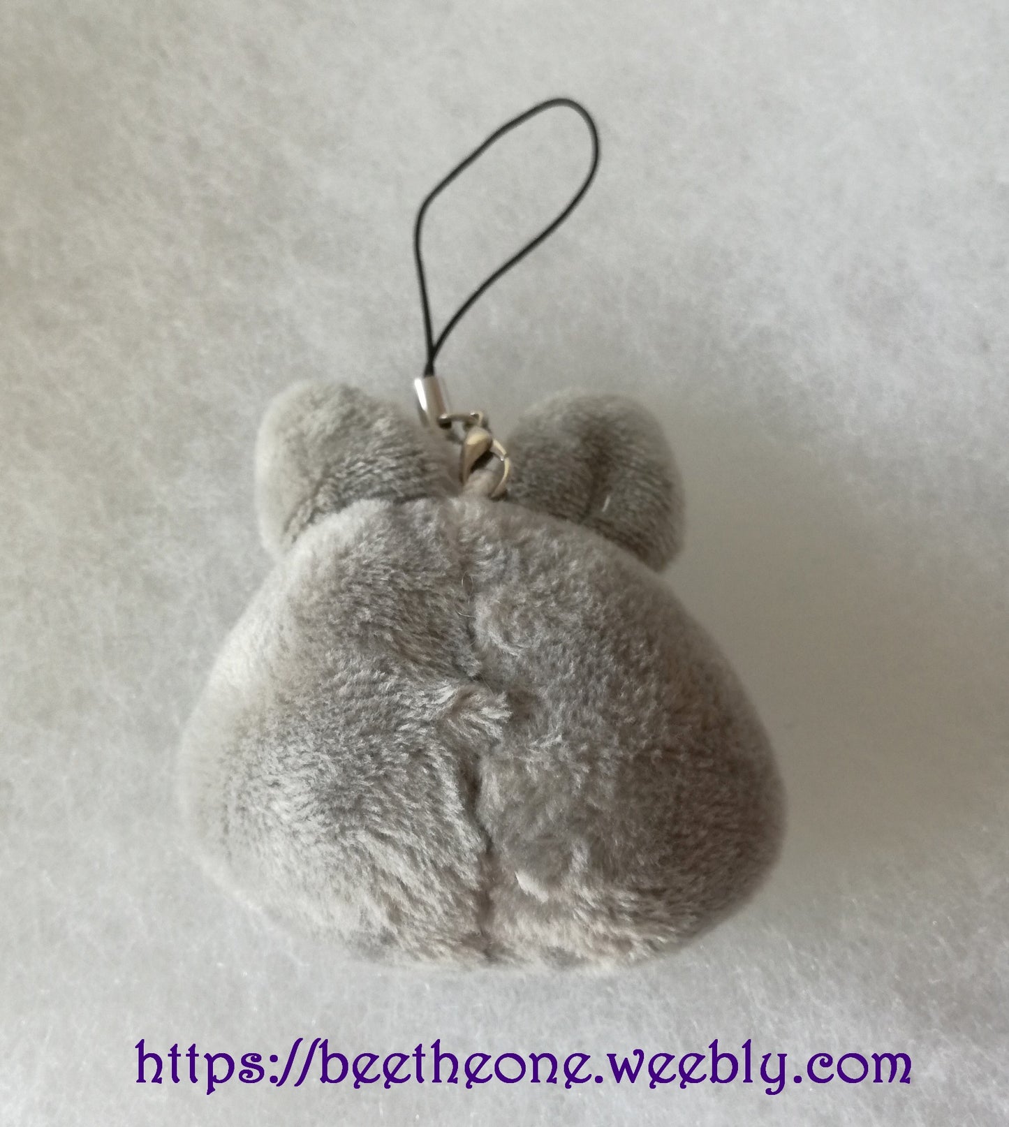 Porte-clé ou Bijou de portable peluche Monstre gris
