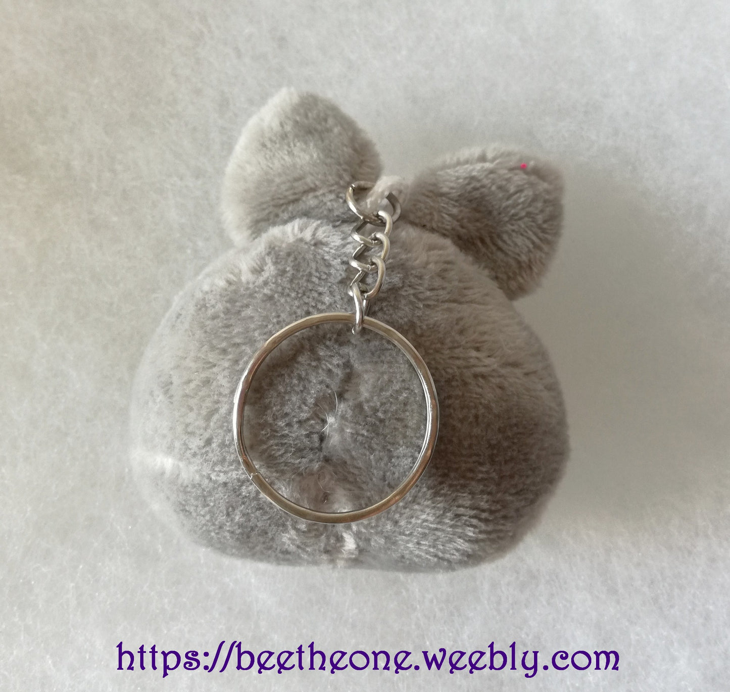 Porte-clé ou Bijou de portable peluche Monstre gris