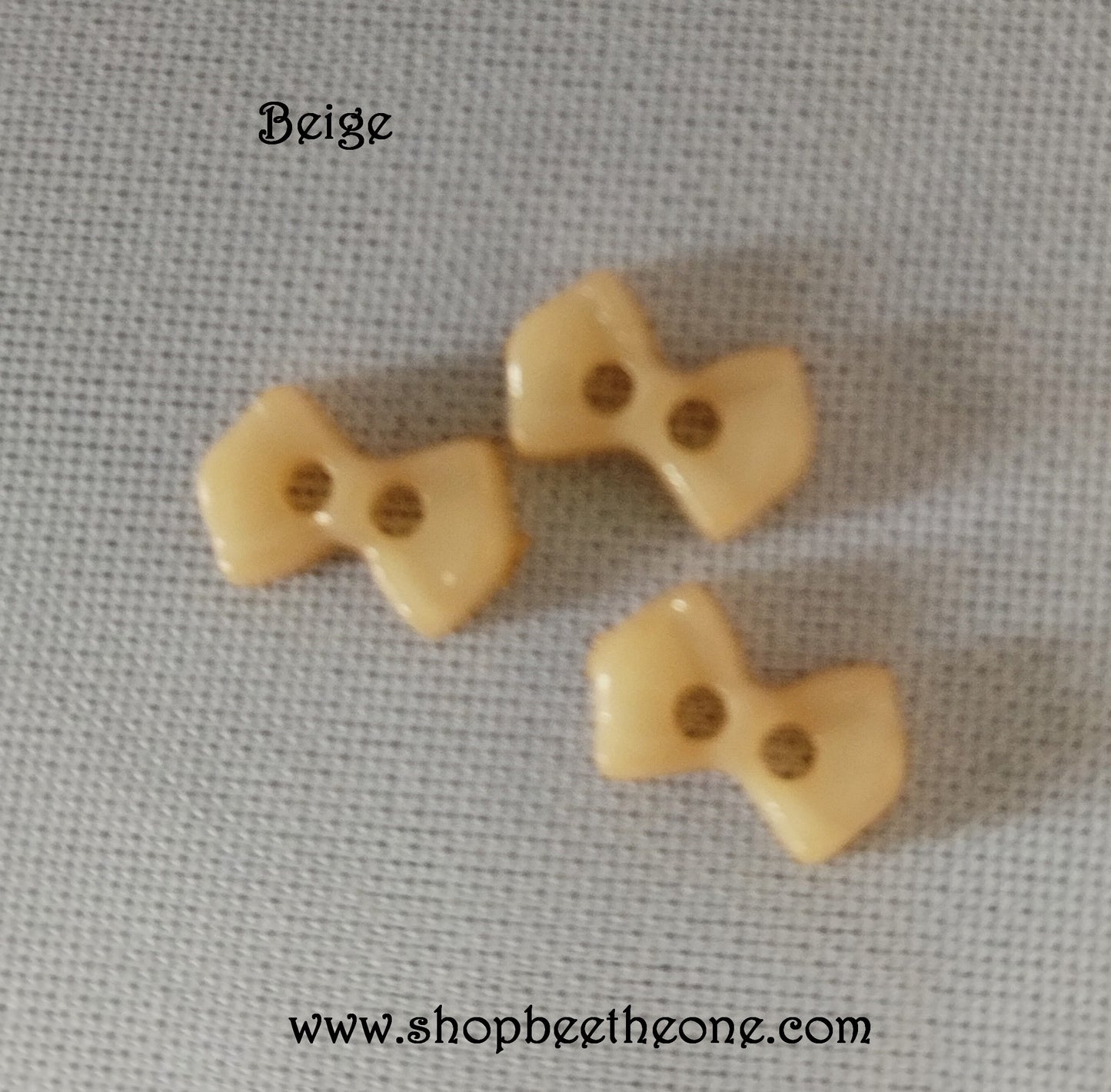 Mini Bouton Noeud en plastique - 9 mm - 12 coloris disponibles