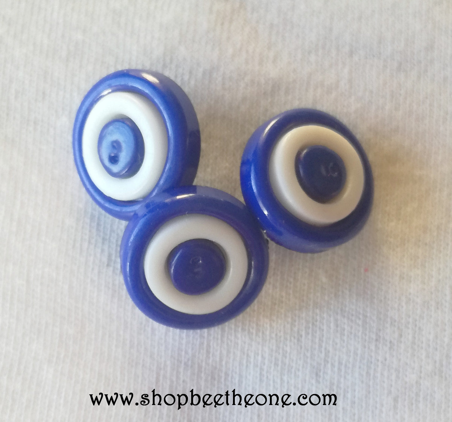 Bouton rond à queue en plastique anneau blanc - 13 mm - 19 coloris disponibles