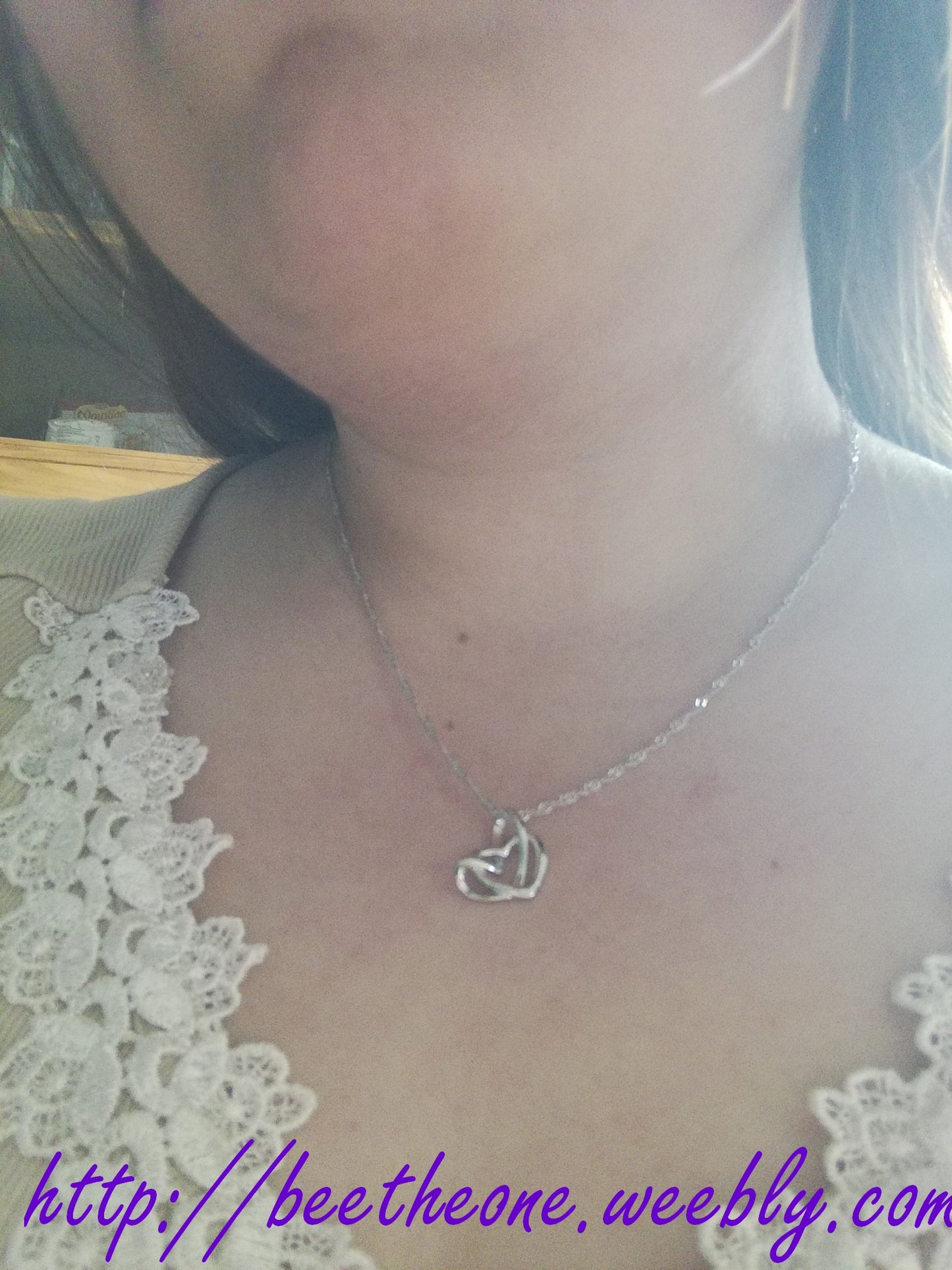 Collier pendentif Double Coeurs argentés