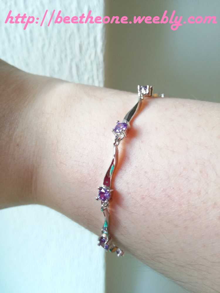 Bracelet minimaliste torsade argentée et strass mauve