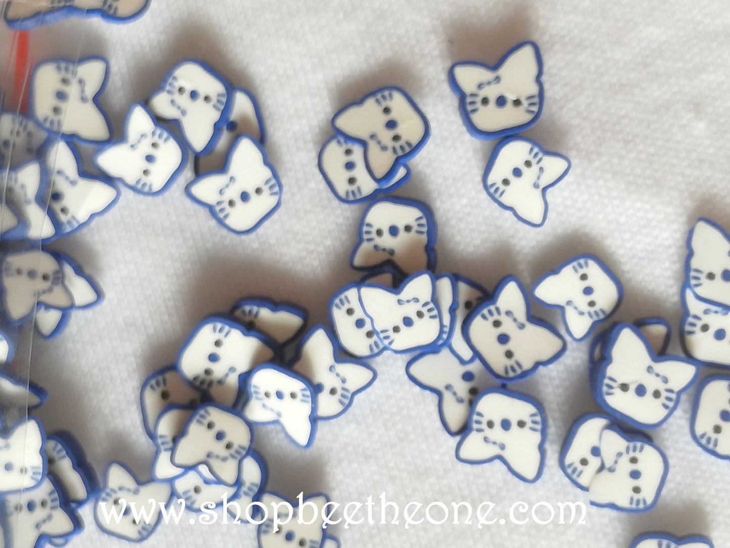 1 g (+/- 50 pièces) de Tranches de Fimo Pâte Polymère Kitty - noeud rose fuchsia ou bleu