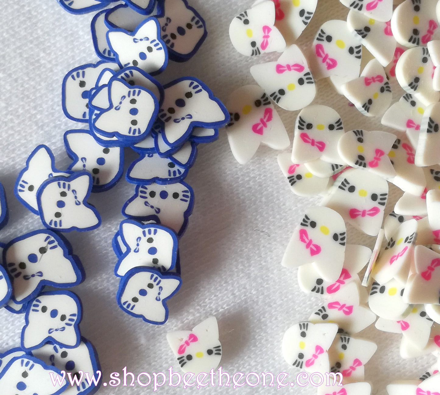 1 g (+/- 50 pièces) de Tranches de Fimo Pâte Polymère Kitty - noeud rose fuchsia ou bleu