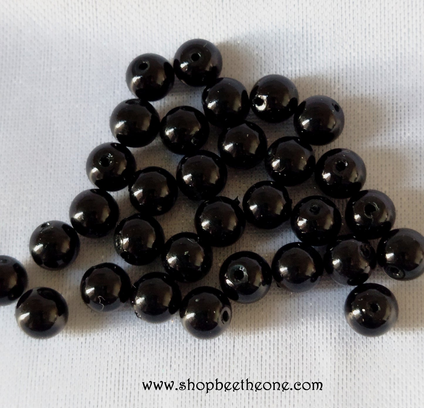 Perle ronde en plastique - 5-6 mm - noir