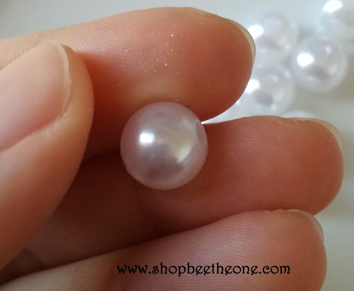 Perle ronde en plastique - 9 mm - Blanc