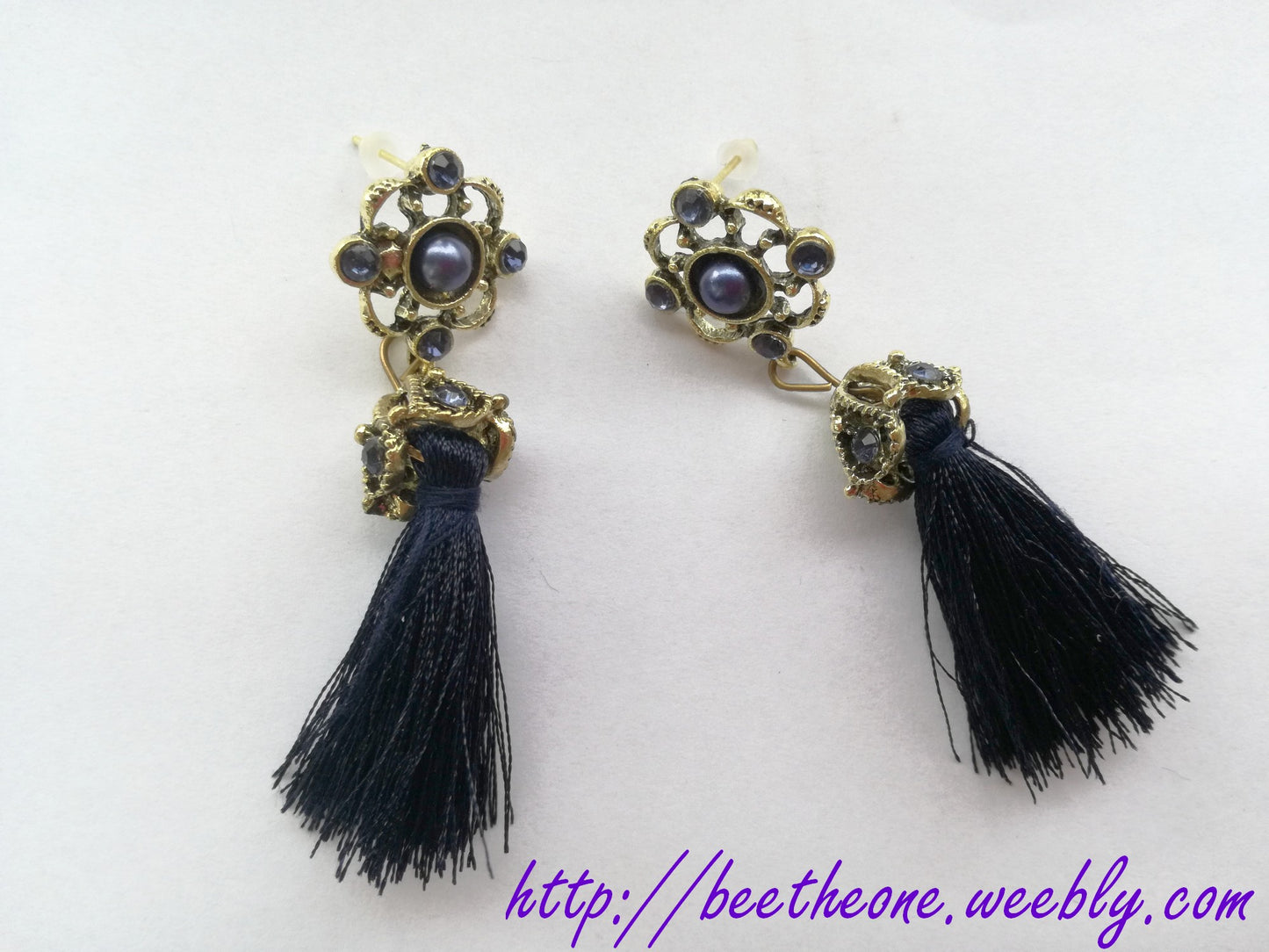 Boucles d'oreilles pompon et perles