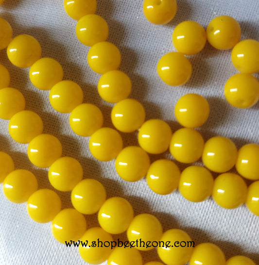 Perle ronde en verre - 6 mm - jaune