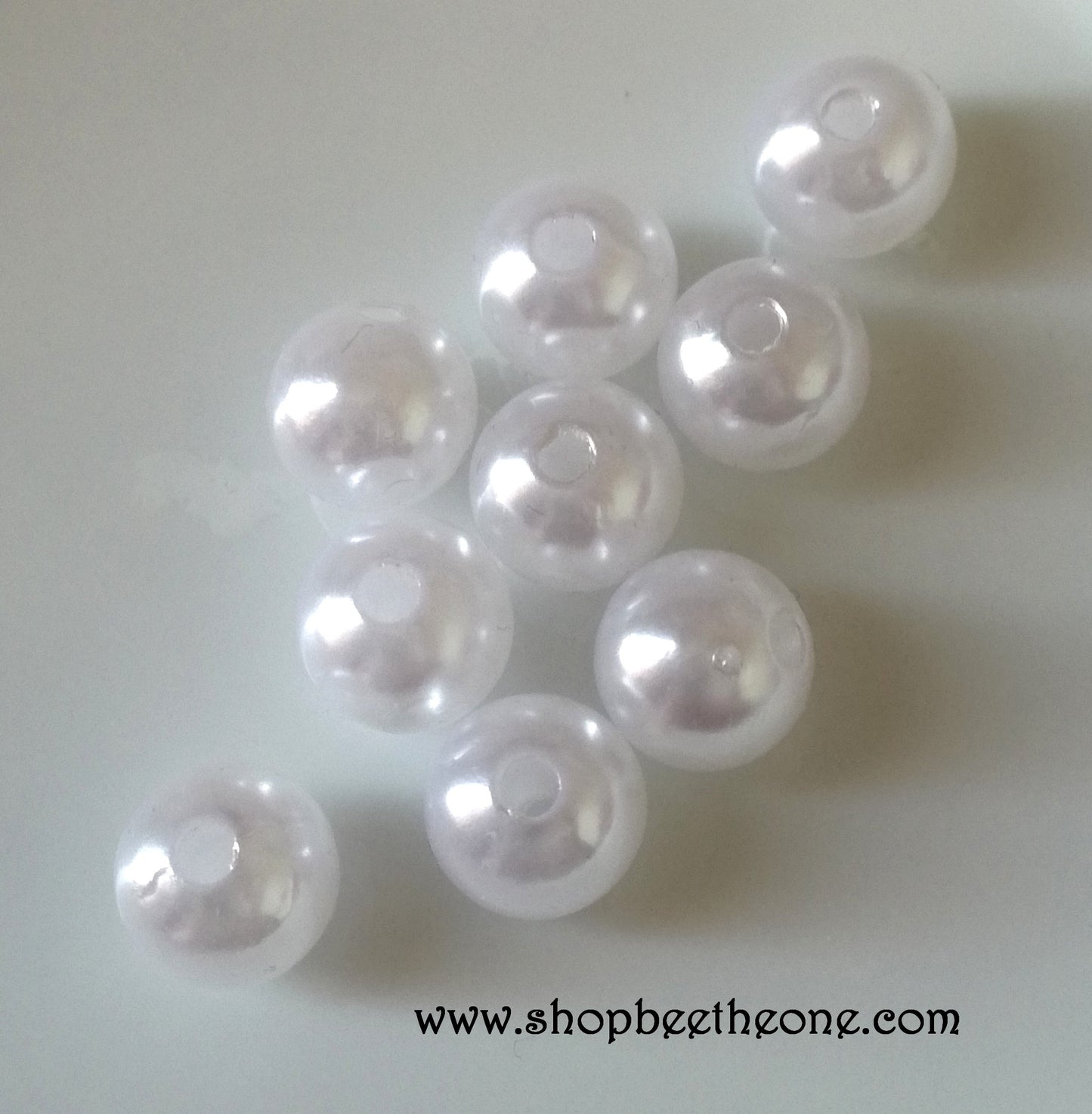 Perle ronde en plastique - 9 mm - Blanc