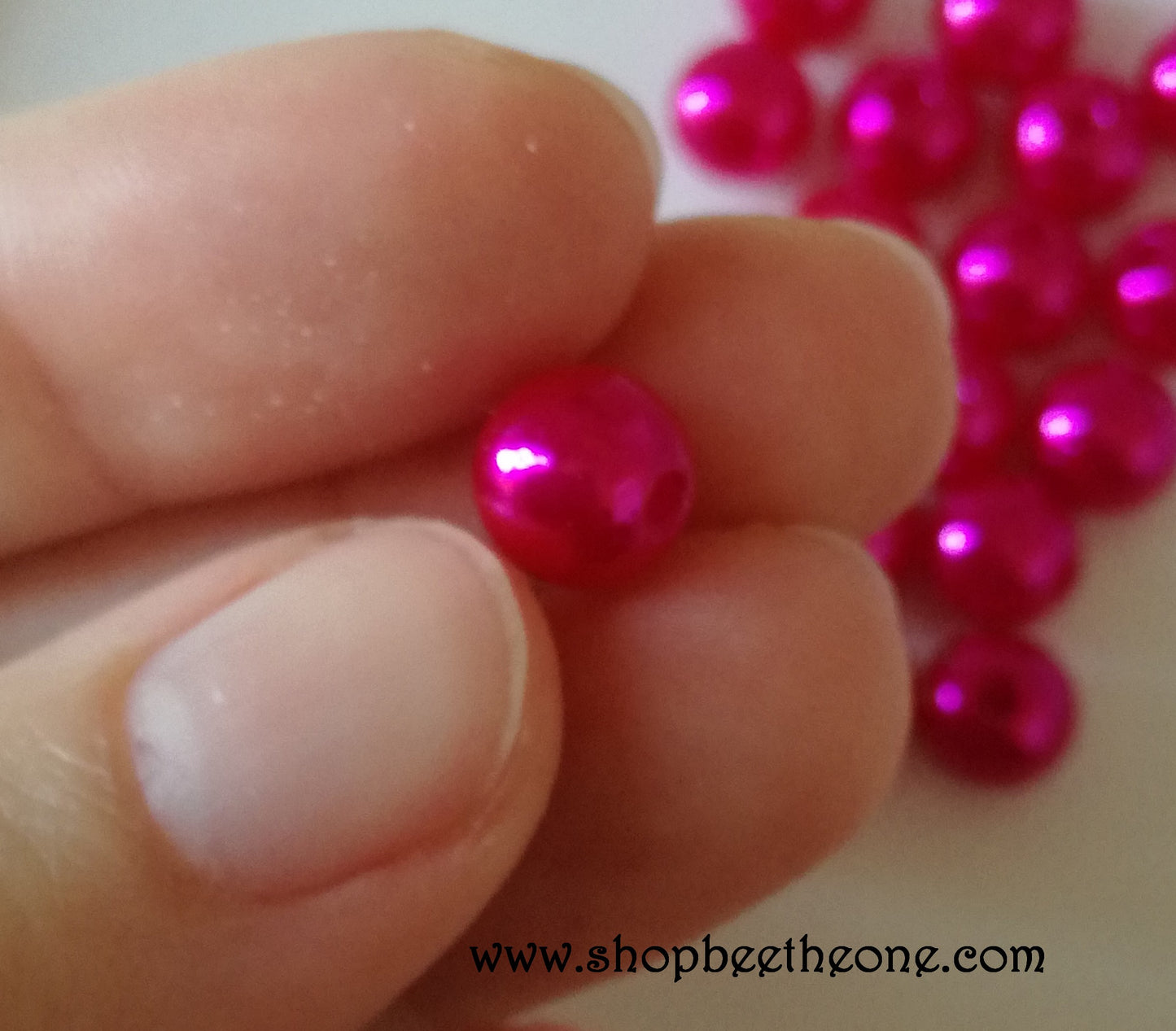 Perle ronde en plastique - 7 mm - rose fuchsia