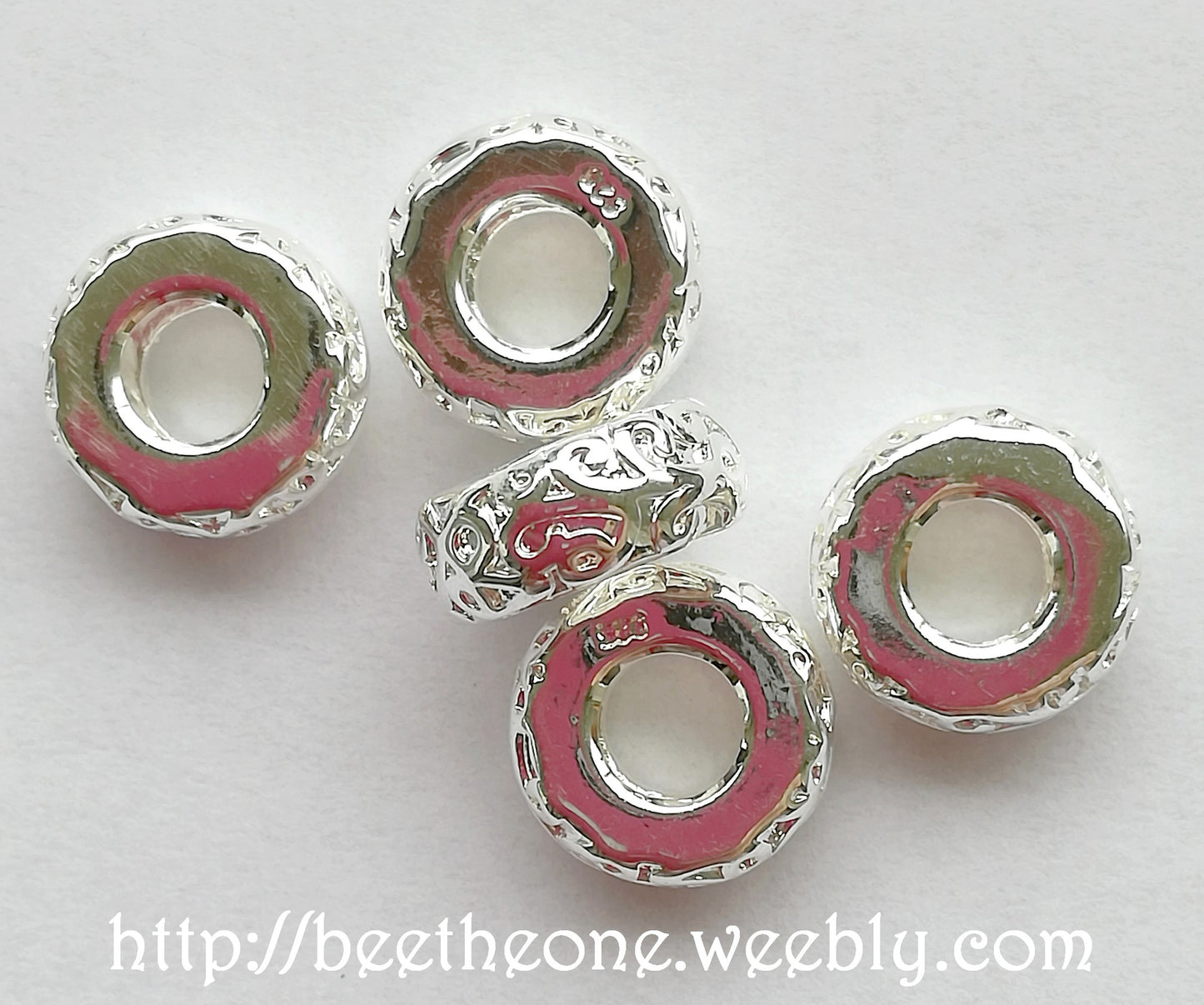 Perles intercalaire rondelle 11 mm motif ciselé - Argenté